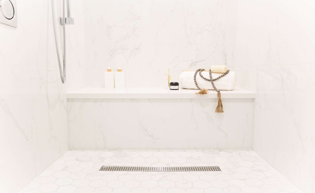How Do Professionals Install Shower Seats on a Tile Wall?