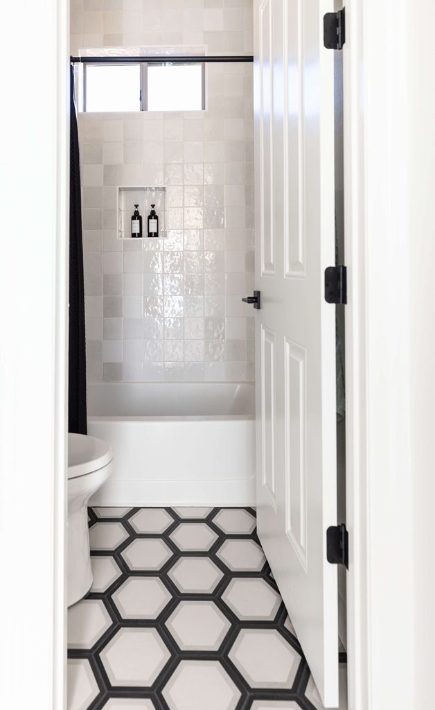 Professionals Install Shower Seats on a Tile Wall