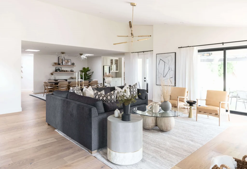 Modern living room with gray sofa and concrete side table