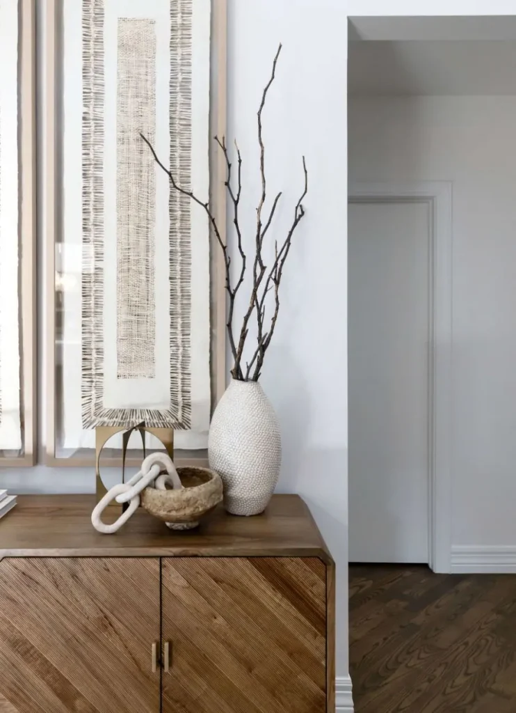 Modern entryway with wood cabinet and minimalist decor
