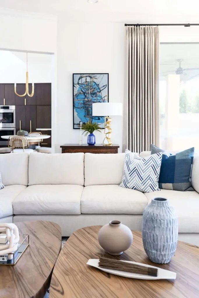 Living room with neutral sofa and stylish decor