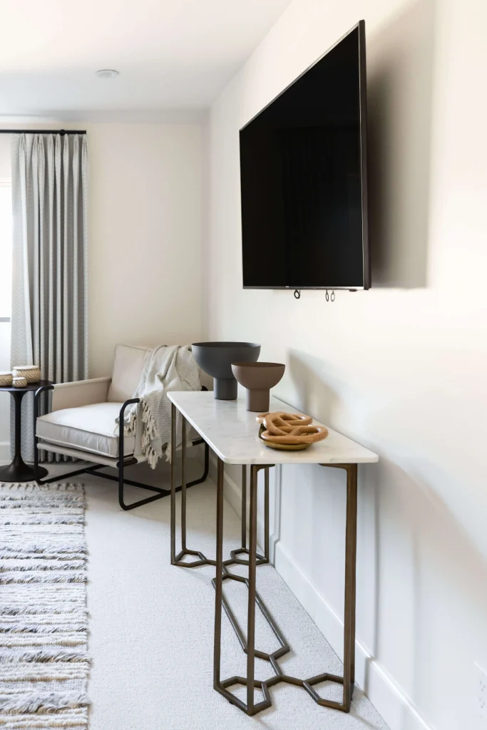 Modern living room with sleek console table and neutral accents