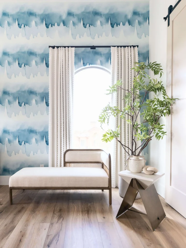 Reading nook with blue watercolor wall