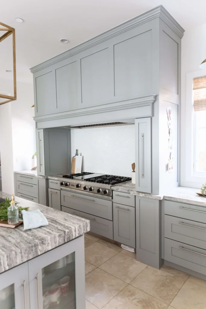Kitchen with gray cabinetry and large gas range