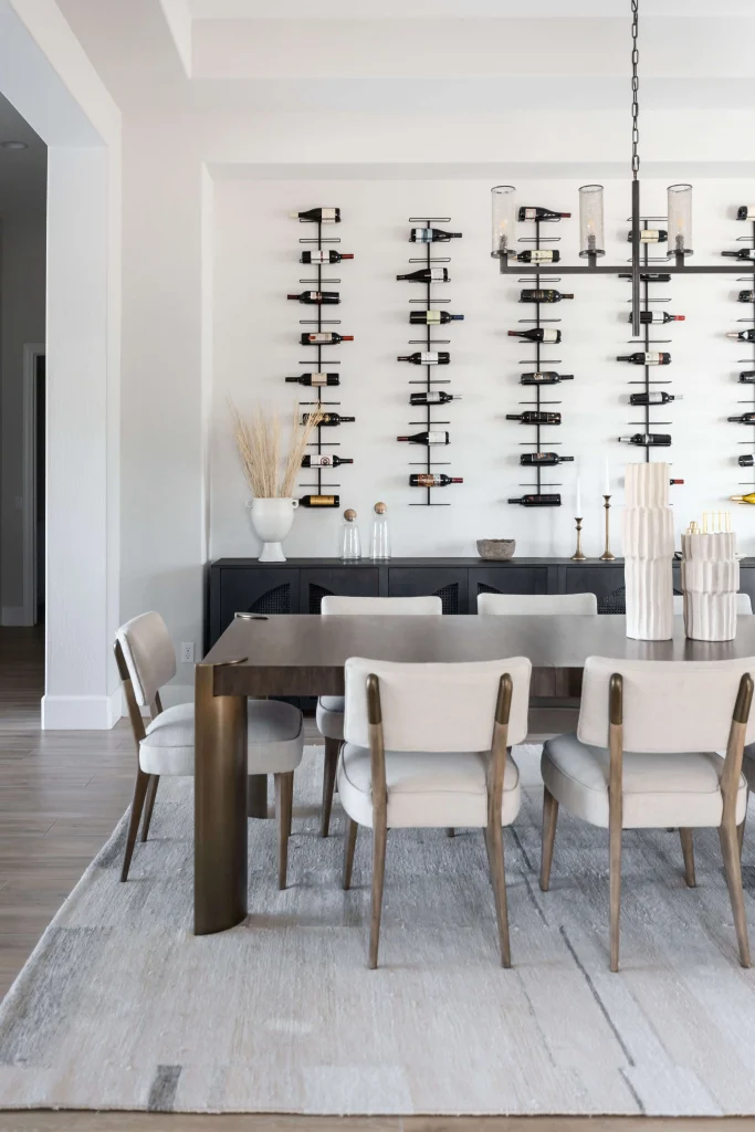 Modern dining room with wine racks on wall