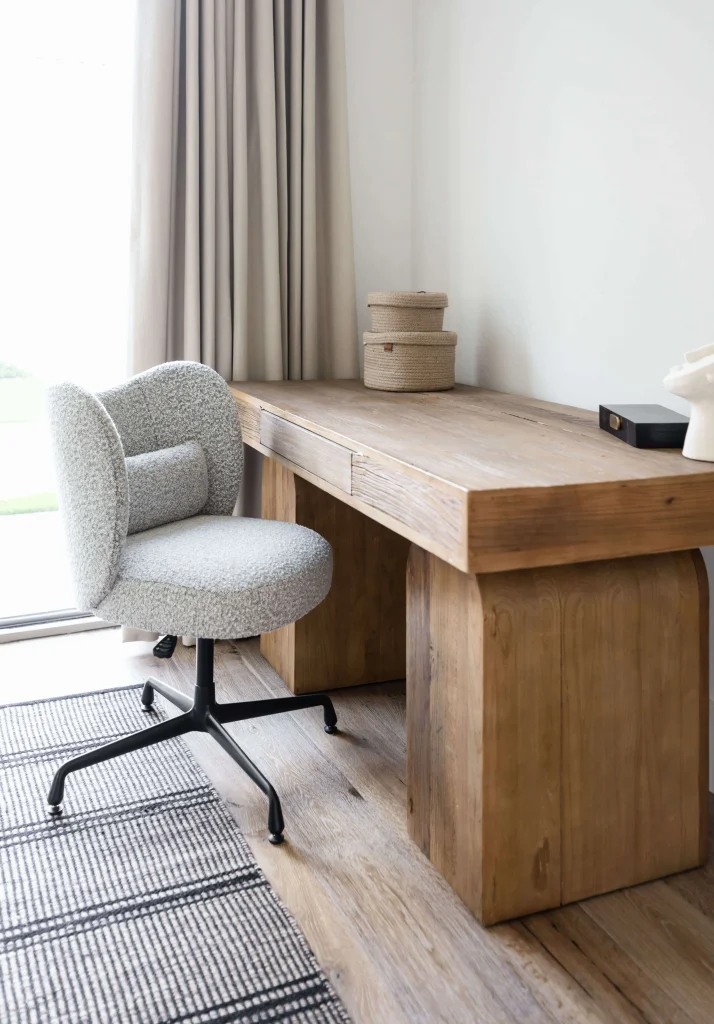 Minimalist desk with boucle chair