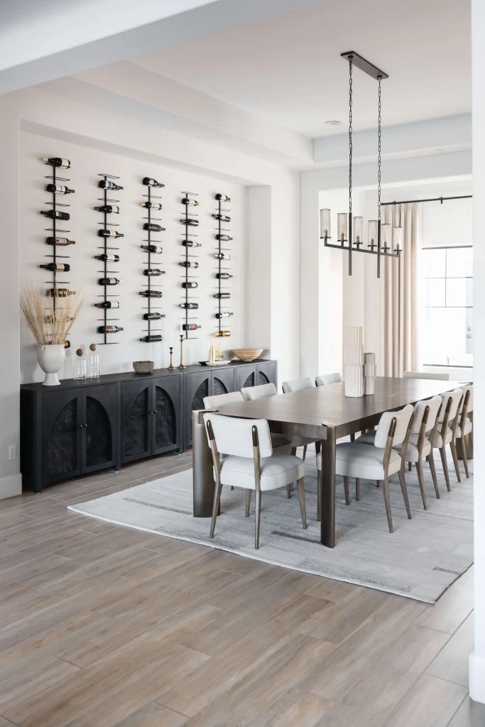 Bright dining room with wine racks on wall