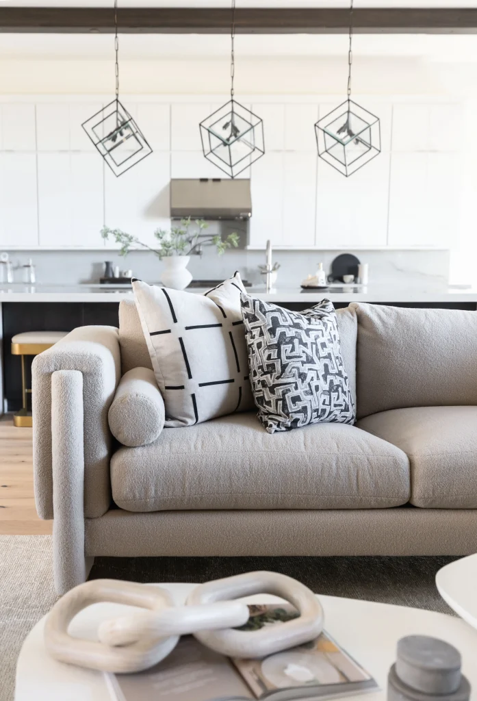 Modern sofa with patterned throw pillows