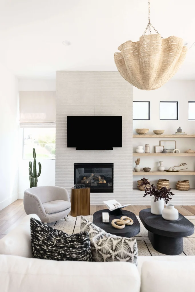 Living room with fireplace and TV