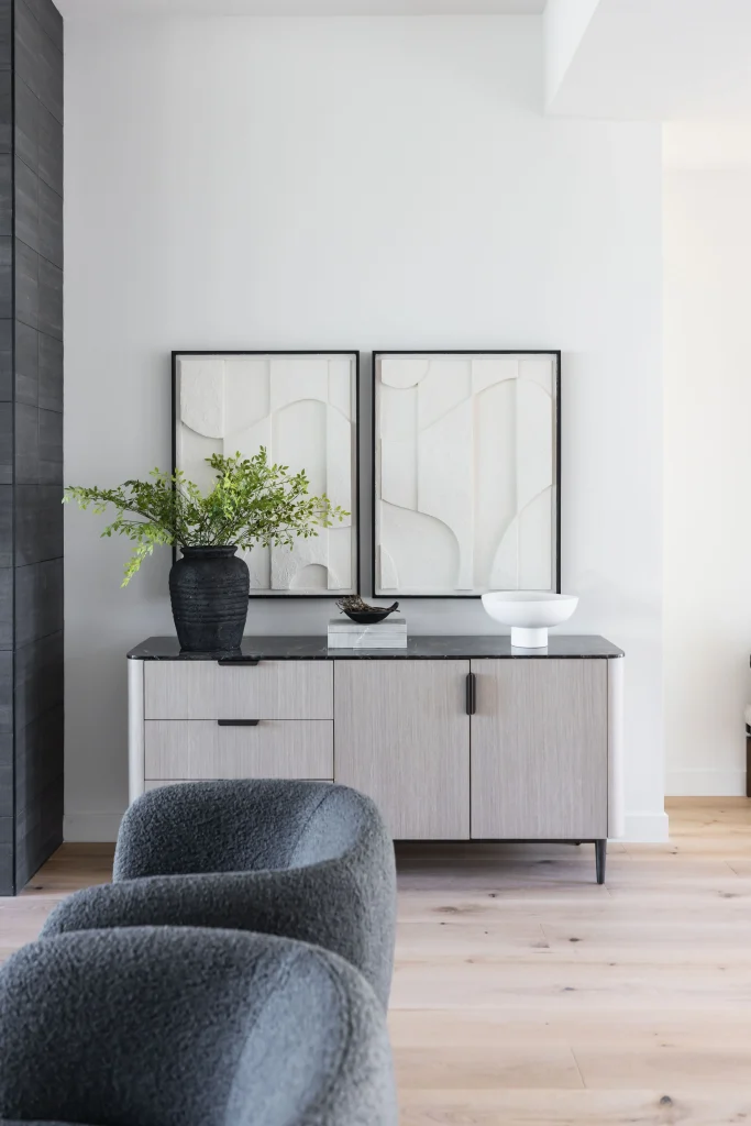 Modern console with framed wall art