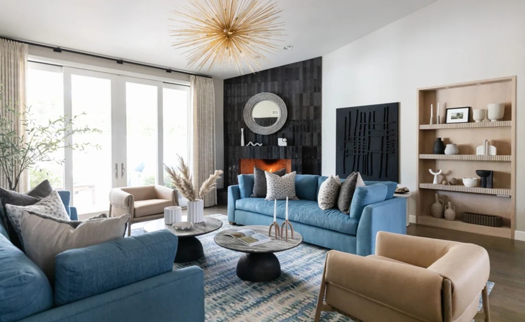 Cozy living room with blue sofas and decor