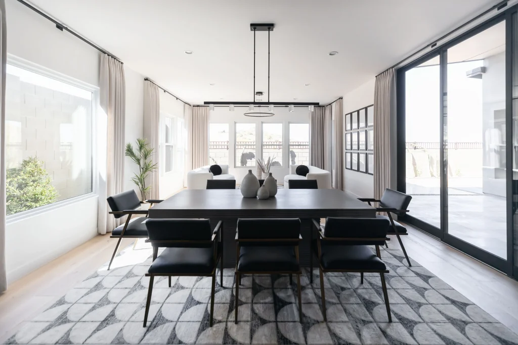 Modern dining room with black chairs
