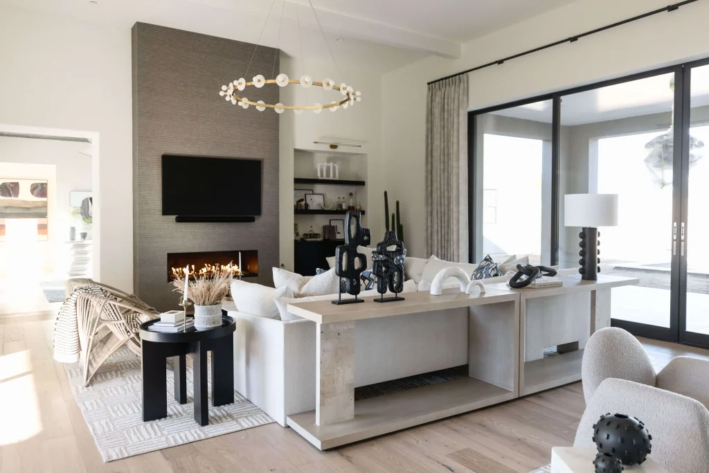 Modern living area with fireplace and black coffee table