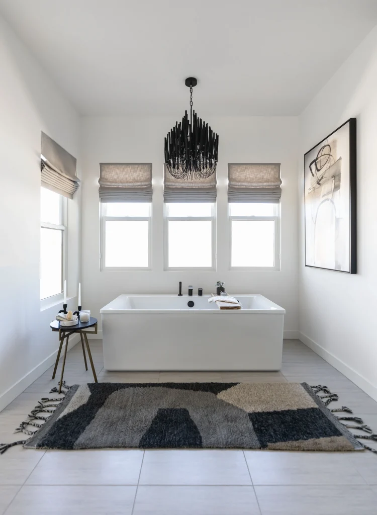 Modern bathroom with tub and rug