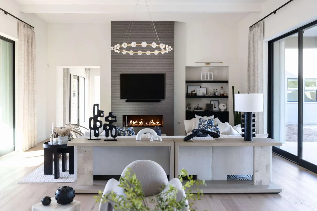Modern living room with fireplace and large windows