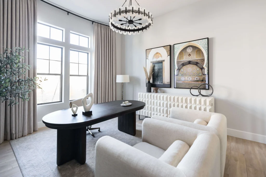 Modern office with black table and white chairs