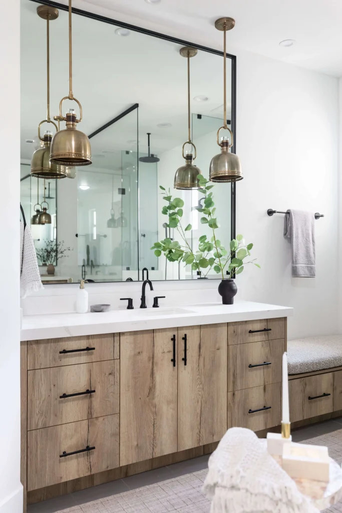Modern bathroom with wood vanity and large mirror