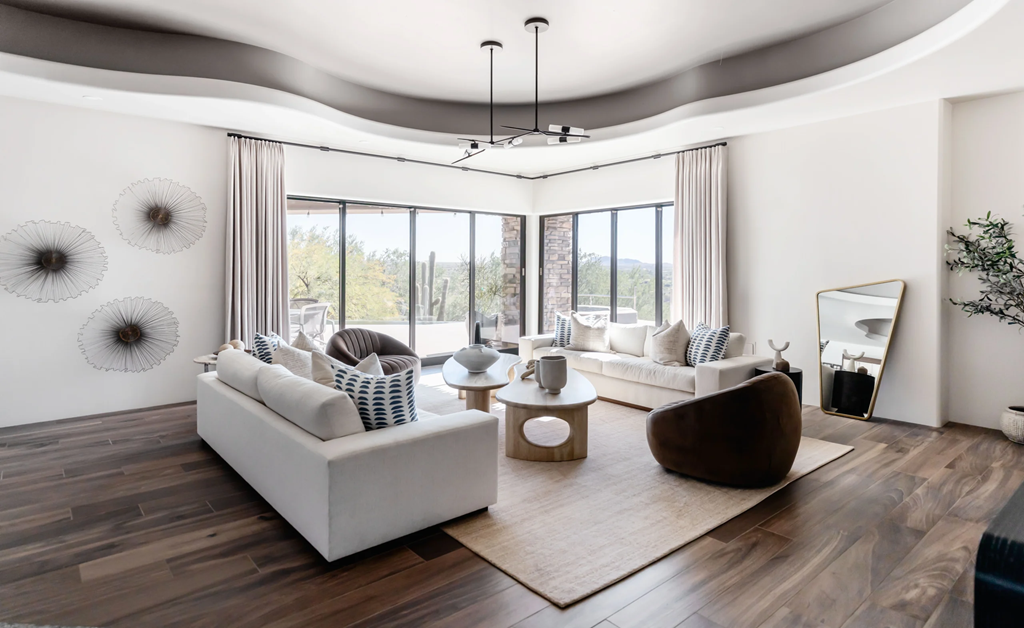 Modern living room with large windows and plants