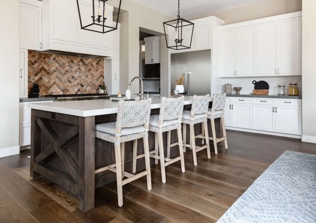 Kitchen with wood island and white cabinets