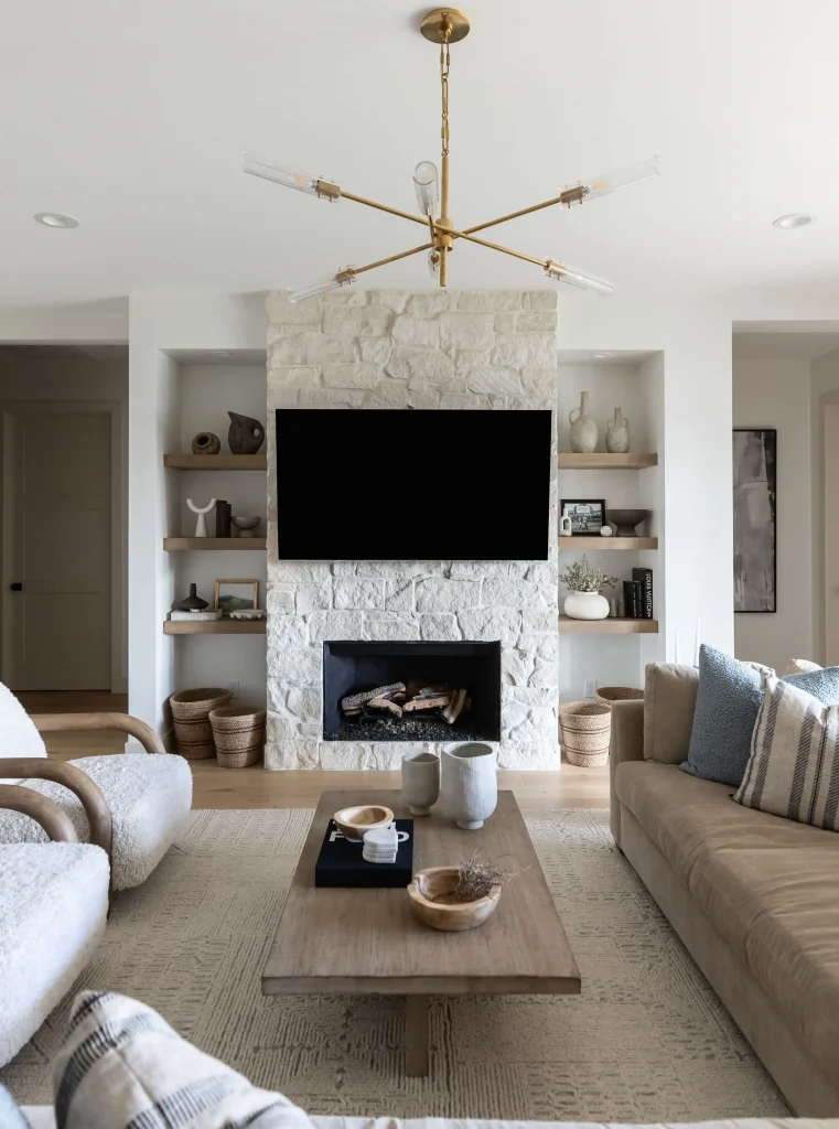Living room with beige sofa and fireplace