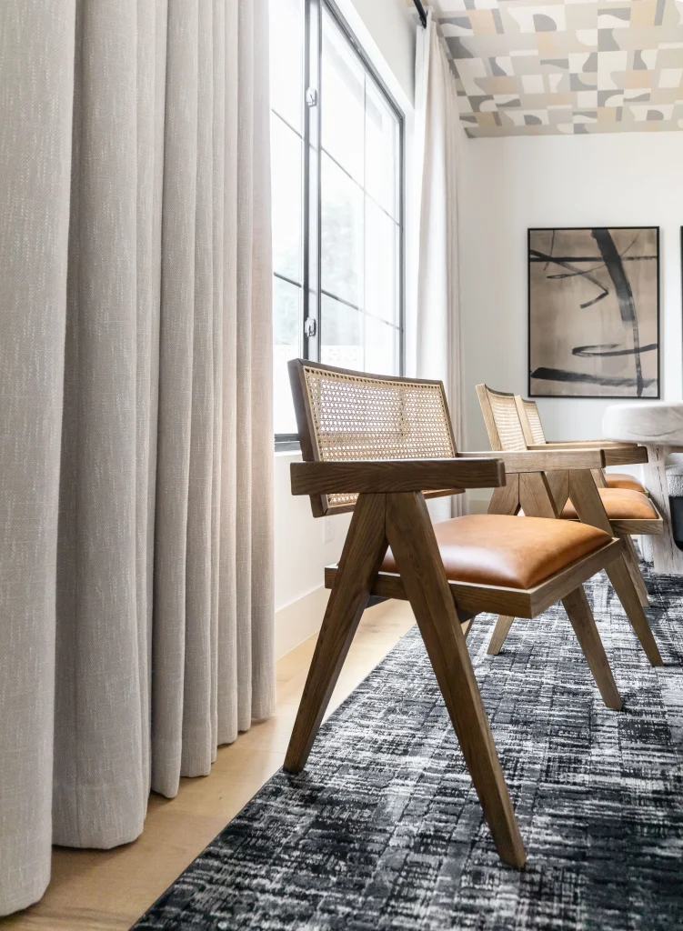 Wooden chair with cane back and leather seat