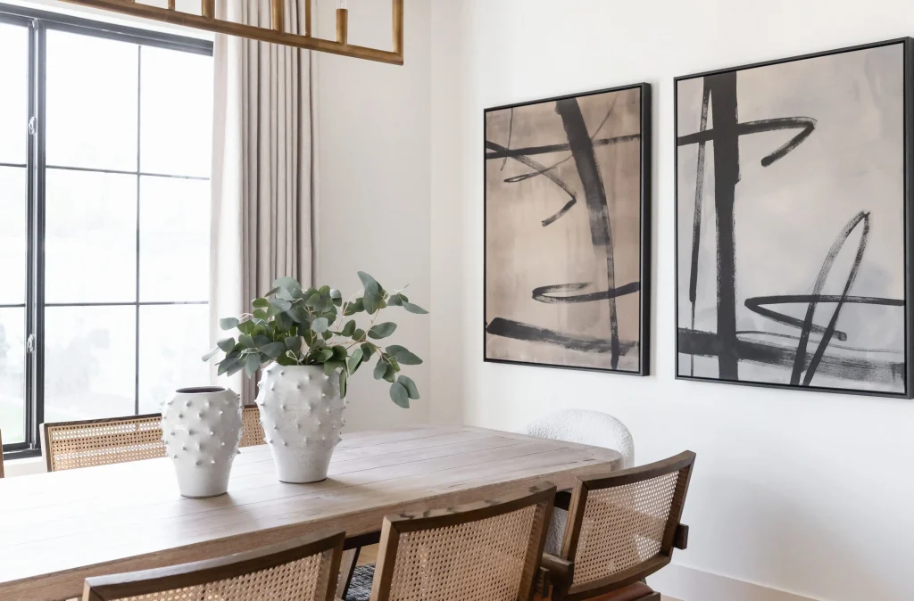Dining table with vases and wall art