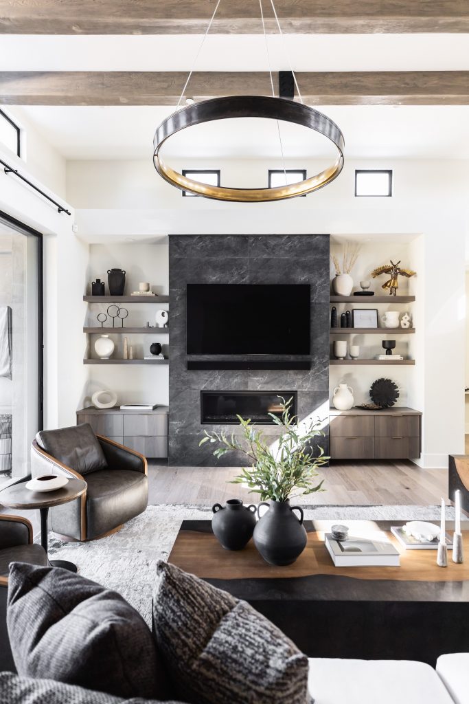 Modern living room with dark stone fireplace