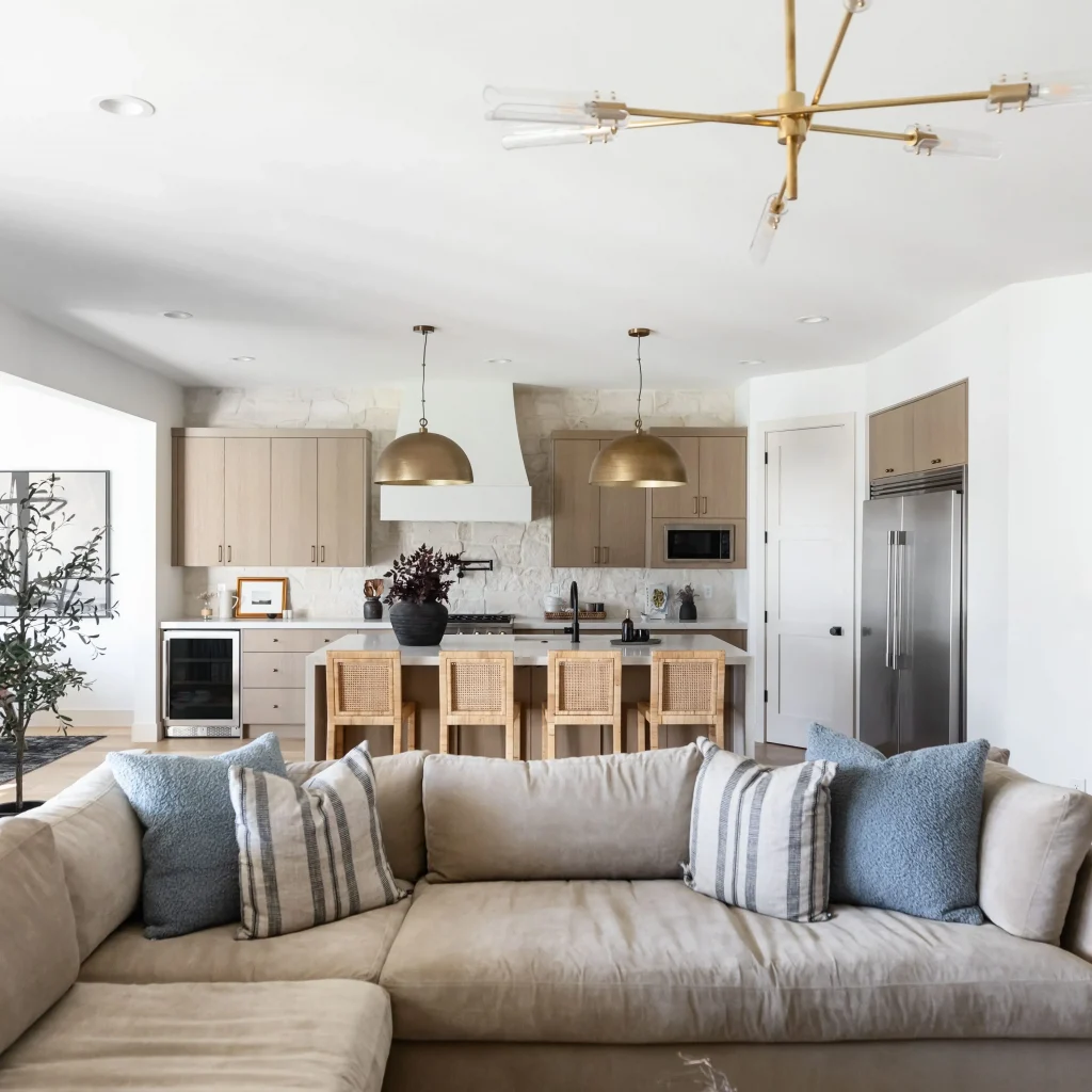 Cozy beige sectional sofa with pillows