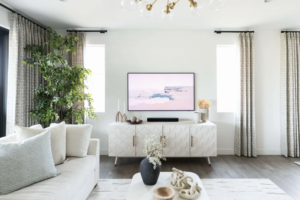Bright living room with white sofa and sideboard