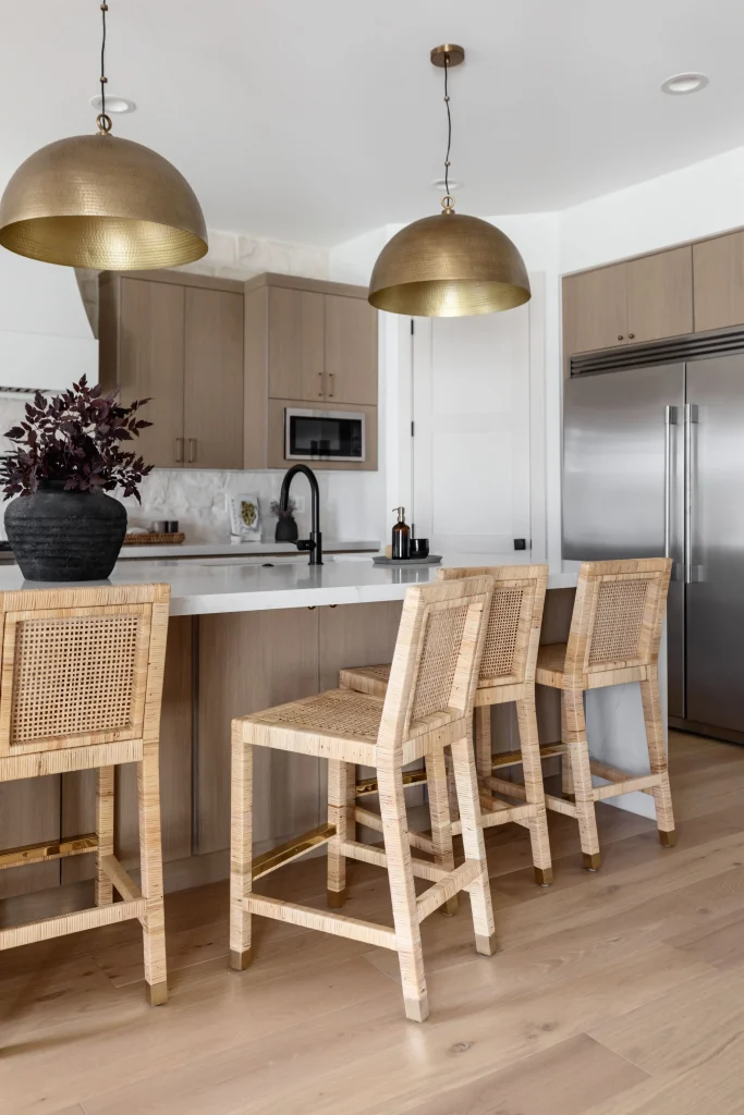 Kitchen island with wicker bar stools