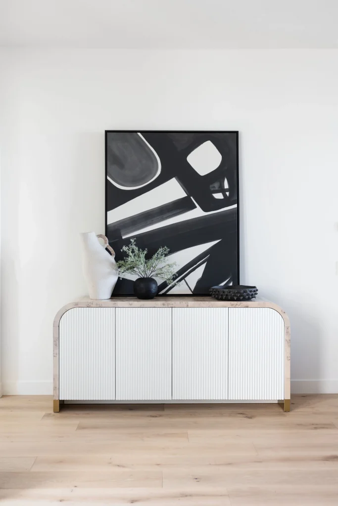 Sideboard with abstract black artwork