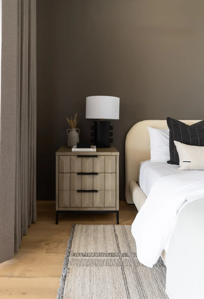 Modern bedroom with dark wood furniture