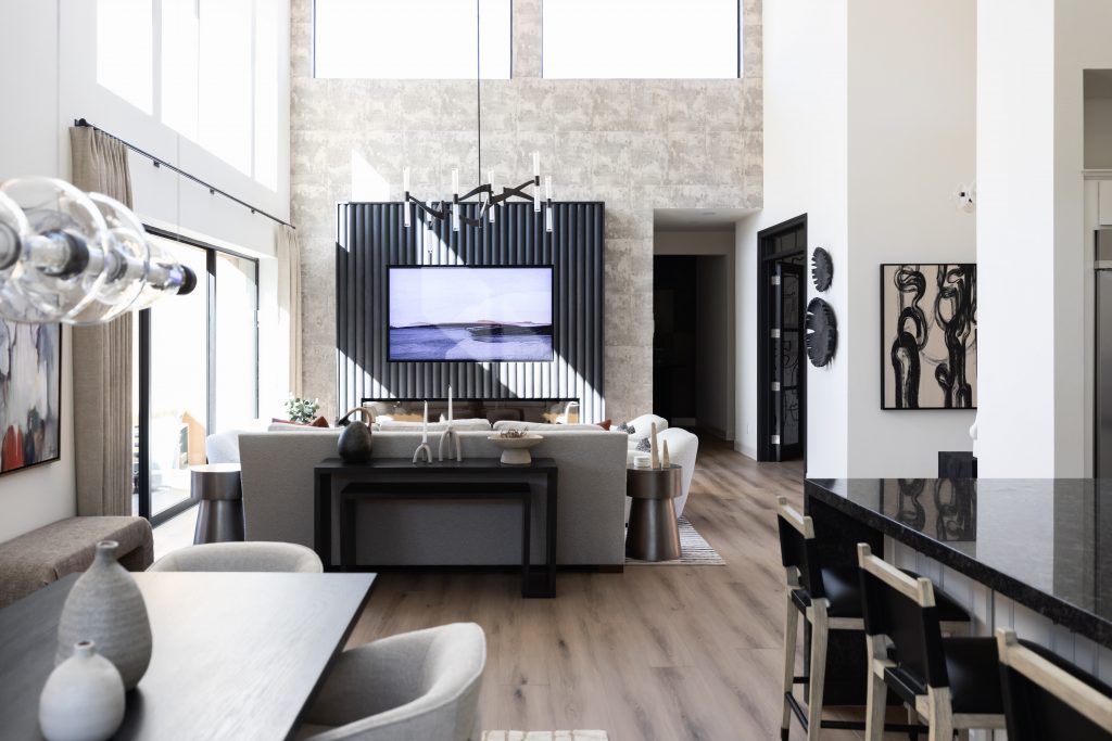 Modern living room with high ceilings and TV