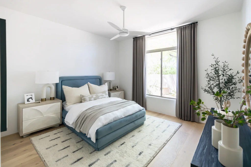 Cozy bedroom with blue bed