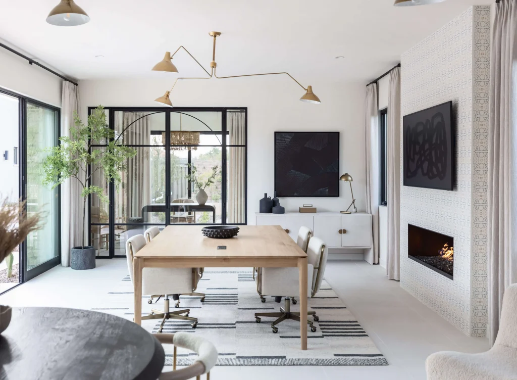 Bright modern home office with large windows and minimal decor