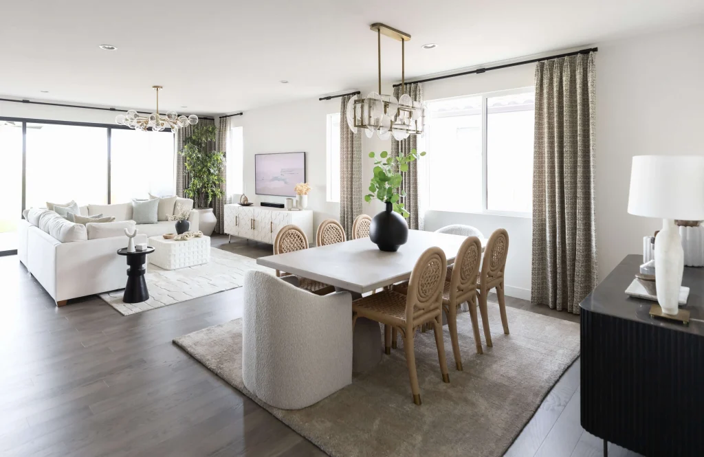 Open-concept living and dining area with natural and neutral tones.