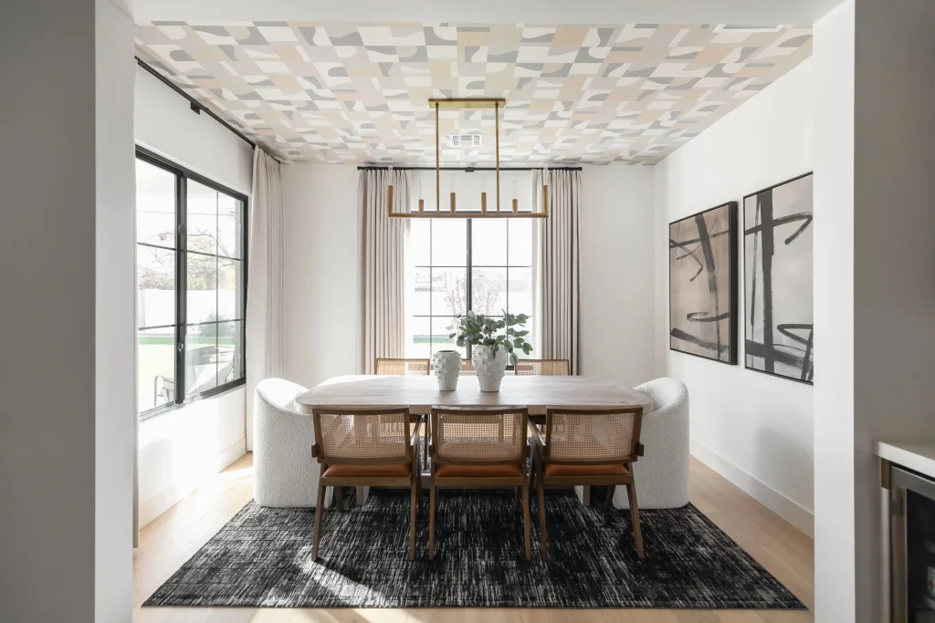 Modern dining room with abstract ceiling