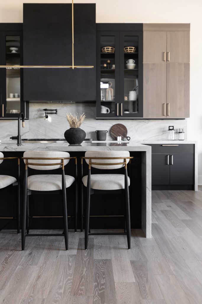 Kitchen with black and wood cabinets