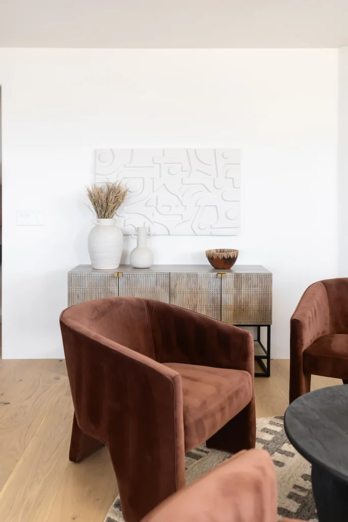 Rust-colored velvet armchairs