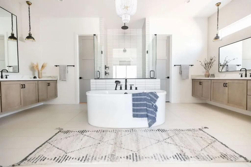 Spacious dual-sink bathroom with central soaking tub