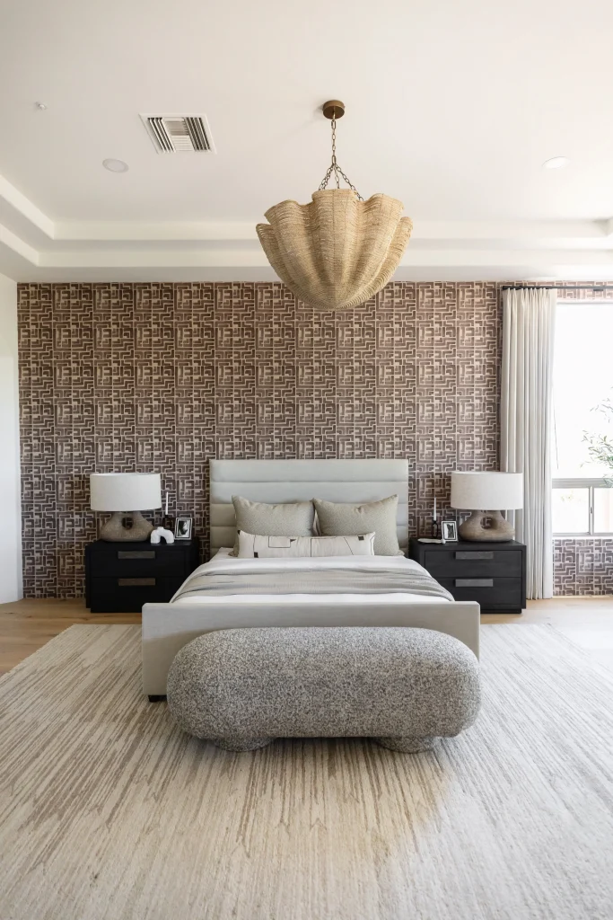 Neutral bedroom with patterned accent wall