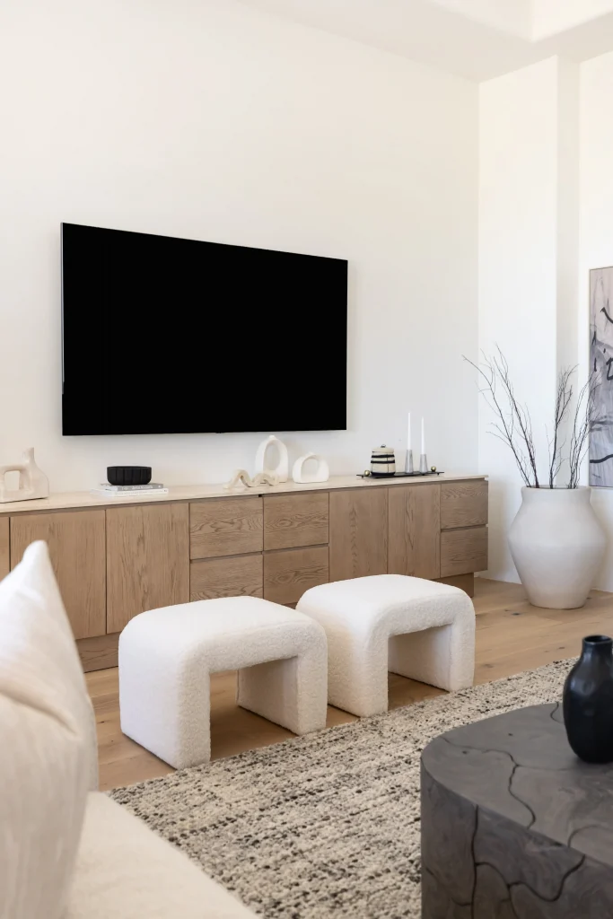 TV console with white stools