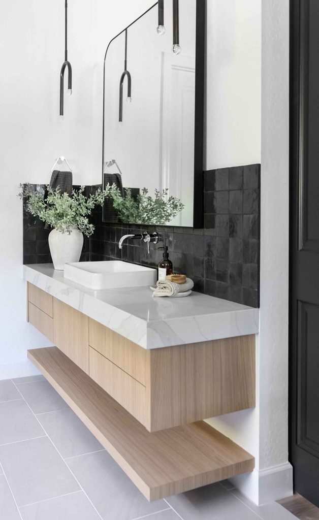 Floating wood vanity with marble countertop