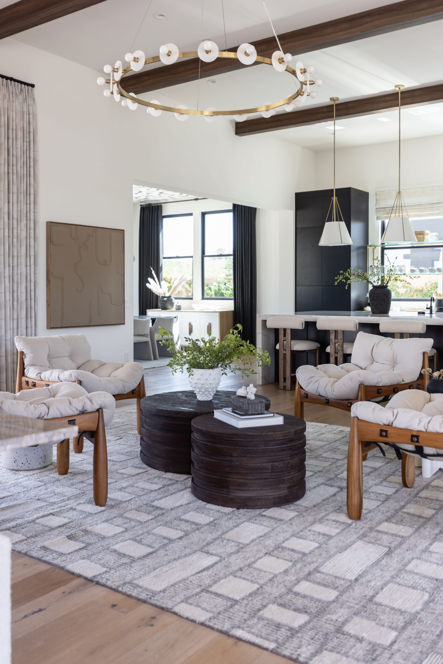 Neutral living room with white sofa and light wood accents