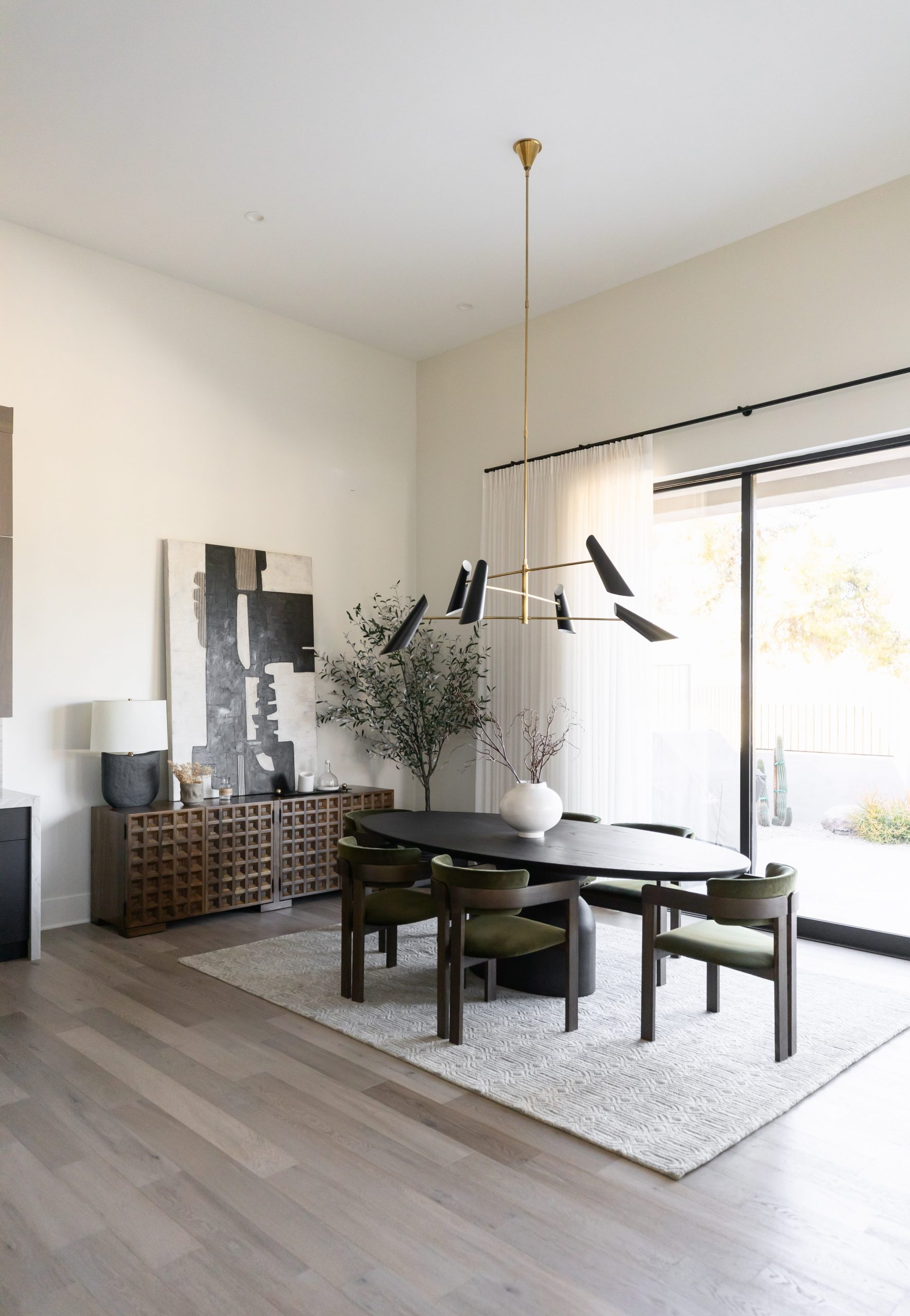 Modern living room with fireplace and large windows 